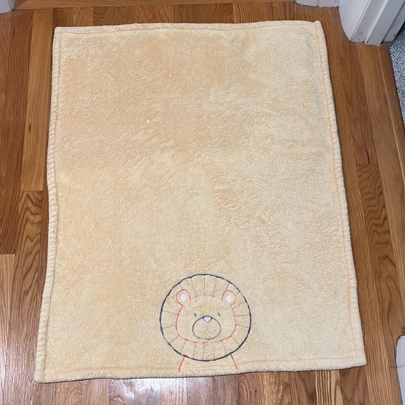 Baby’s, brown bear fleece blanket. Yellow with face of brown bear on front. - Picture 3 of 4